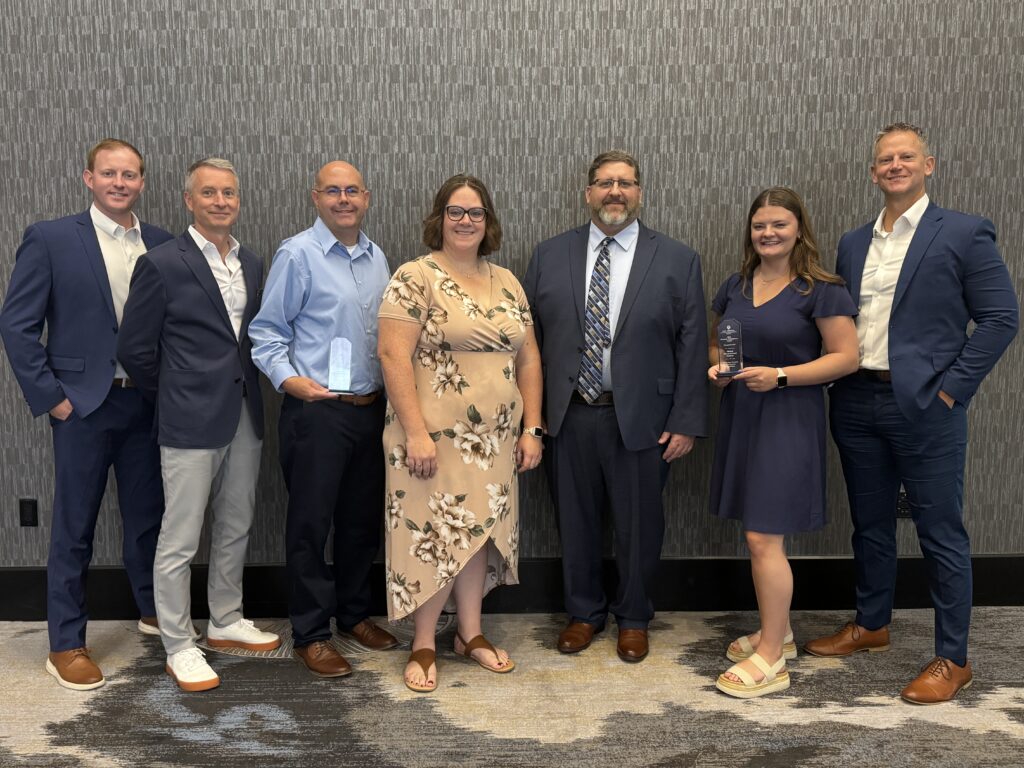 Photo of members of SEDC and the Iowa Lakes Corridor Development Corporation.